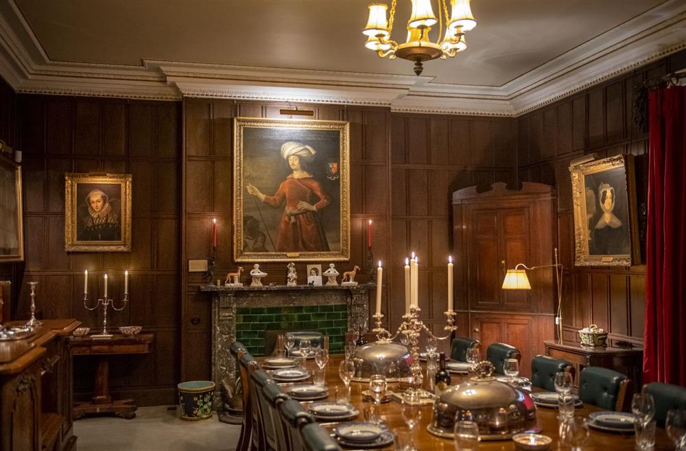 The formal Dining room with original oak panelling at Upper Helmsley Hall, York