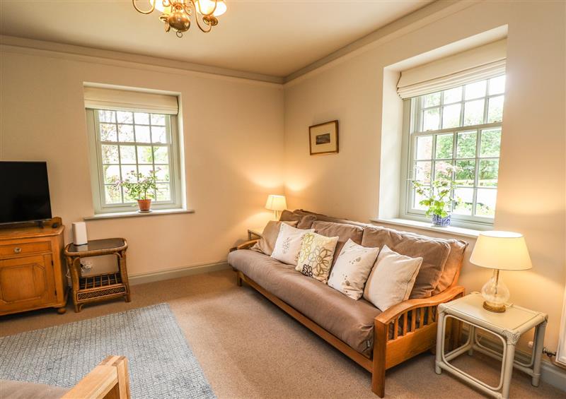 Relax in the living area at Upper Lodge, Bowness-on-Windermere