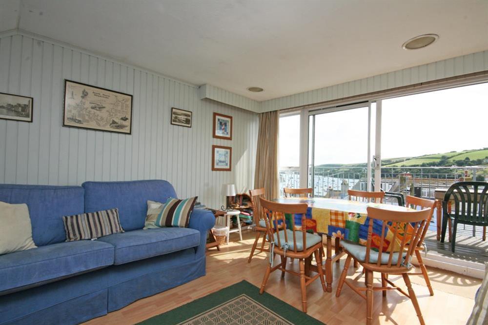 Open plan dining area with estuary views at Upper Marcam House in 9a Church Street, Salcombe