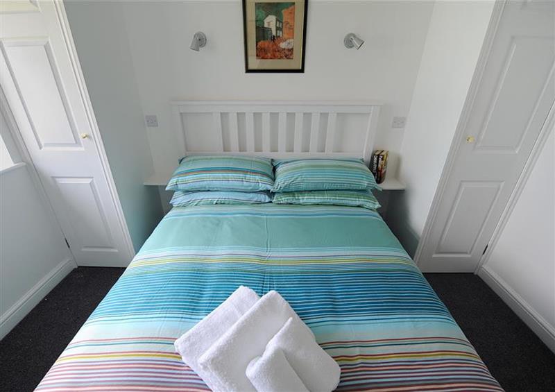 A bedroom in Upper Seascape at Upper Seascape, Lyme Regis