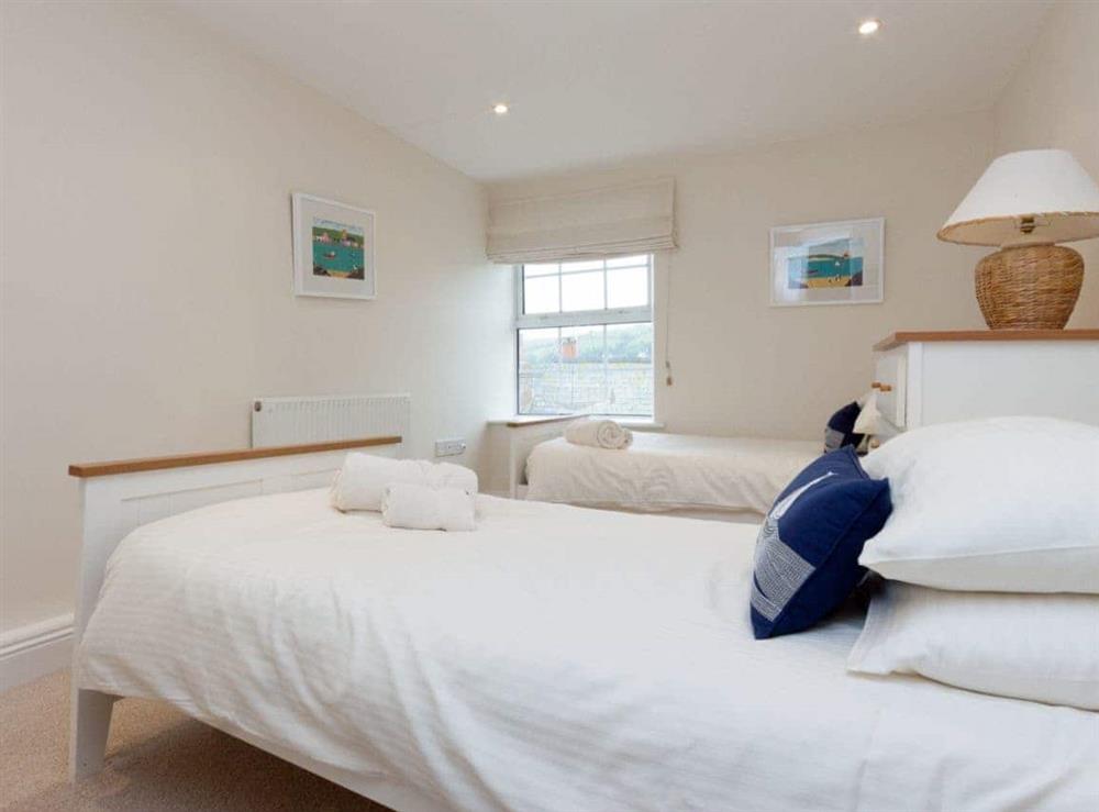 Comfy twin bedroom at Upper Sheldon House in Buckley St, Devon