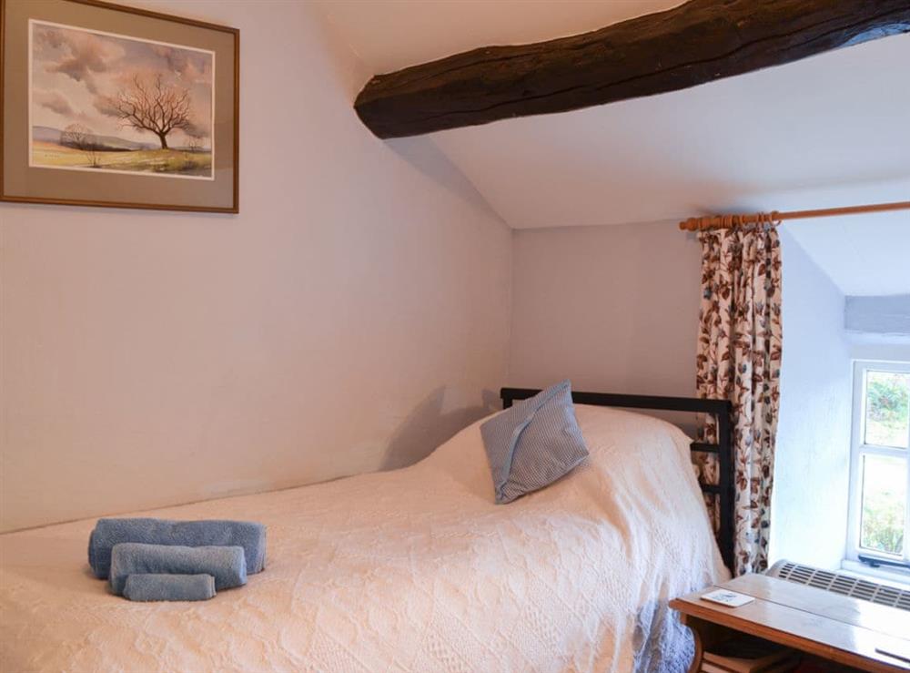 Charming twin bedded room (photo 2) at Upper Stanbatch Cottage in Wentnor, near Bishops Castle, Shropshire