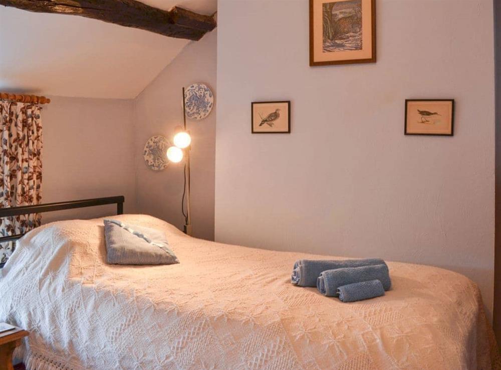 Charming twin bedded room at Upper Stanbatch Cottage in Wentnor, near Bishops Castle, Shropshire