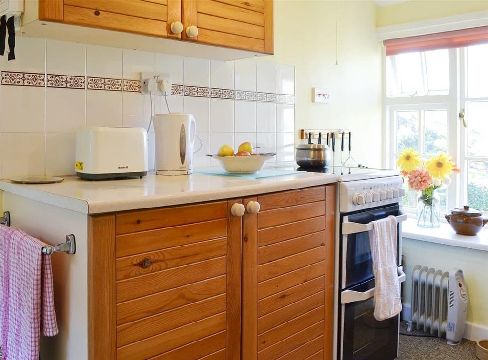 Well equipped kitchen at Upper Stanbatch Cottage in Wentnor, near Bishops Castle, Shropshire