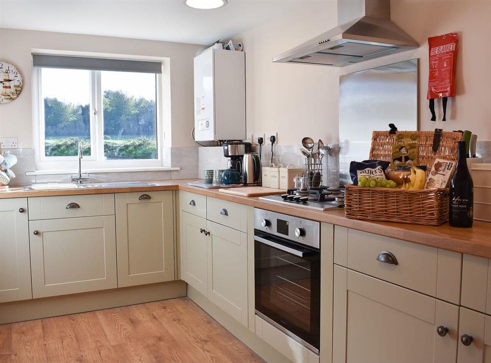 Kitchen with plenty of space at Carpenters Cottage, 