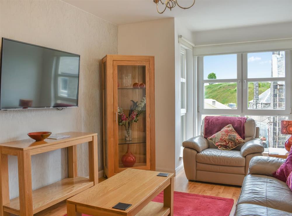 Living room at Urquhart Beach Condo in Aberdeen, Aberdeenshire