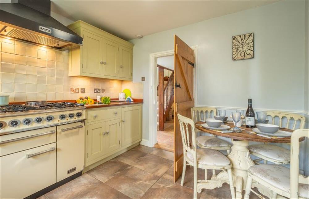 Kitchen dining space with range style cooker at Valentine Cottage, Snape Watering