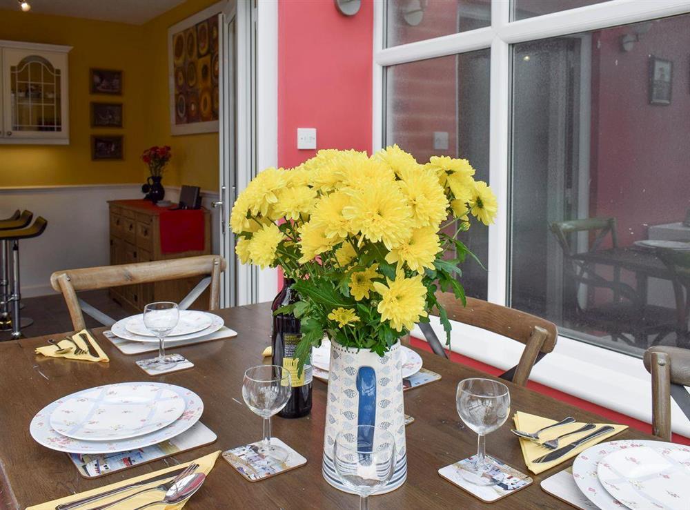 Ample dining space within conservatory at Valentines On Love Lane in Whitby, North Yorkshire