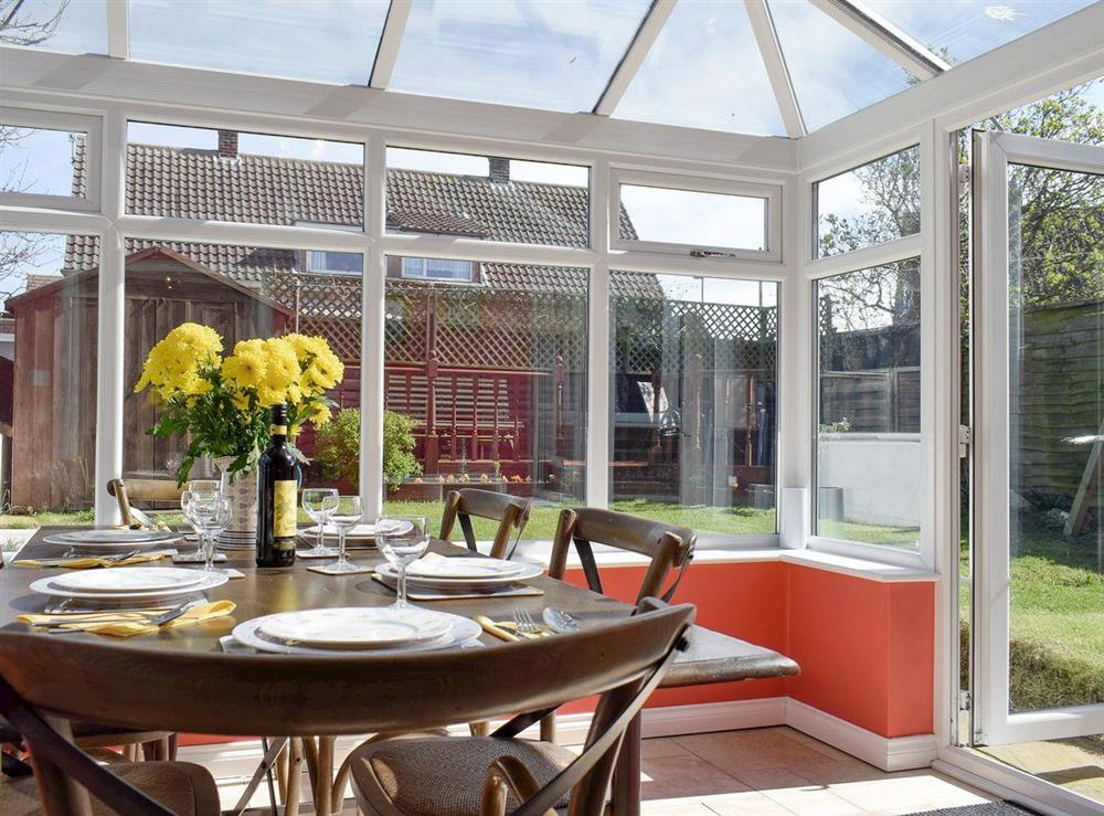 Spacious dining area within conservatory at Valentines On Love Lane in Whitby, North Yorkshire