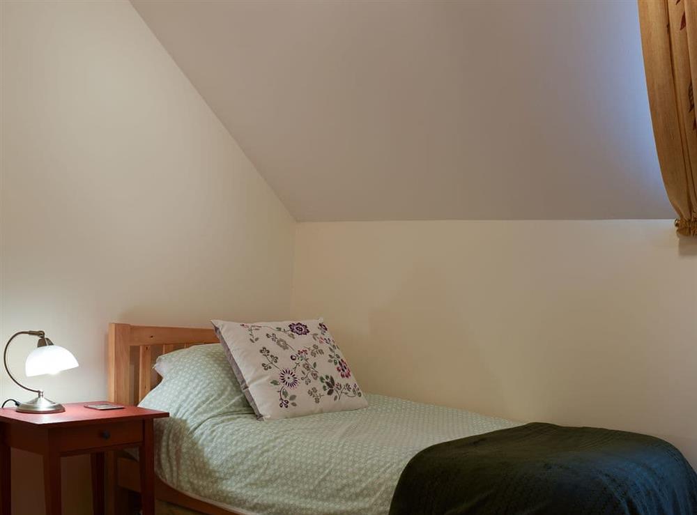 Cosy single bedroom with sloping ceiling at Valeview Cottage in Great Malvern, Worcestershire, England