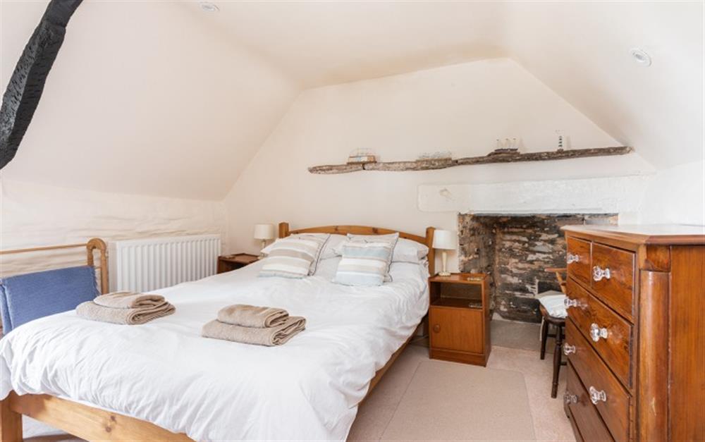 The main bedroom at Valley Cottage in Slapton