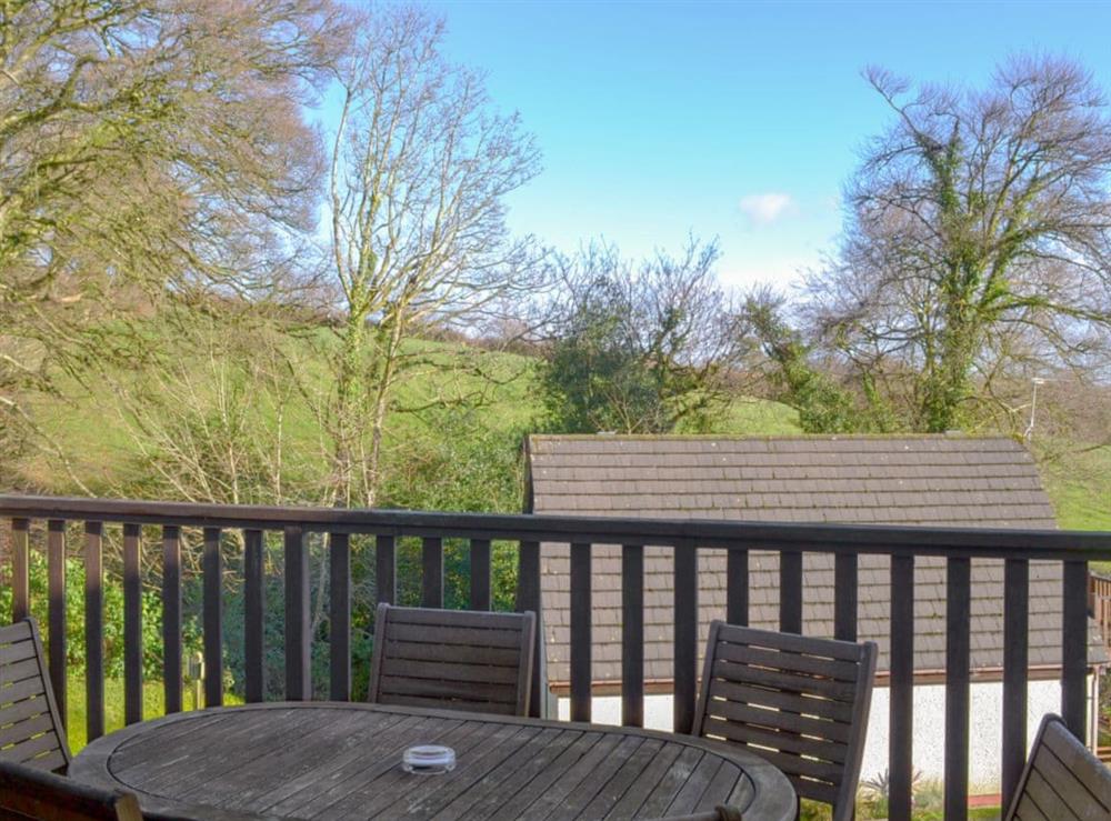 Relaxing sitting out area on the decked balcony at Valley Lodge 47 in Gunnislake, near Callington, Cornwall