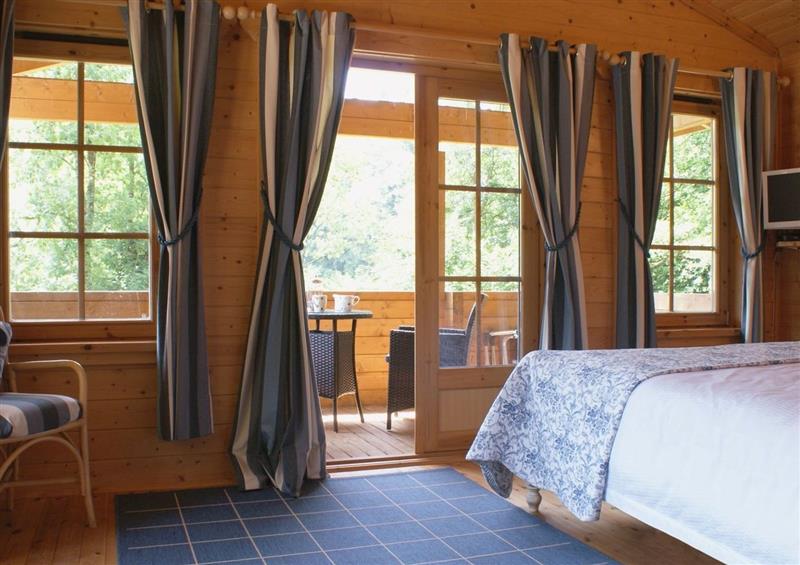 A bedroom in Valley Lodge at Valley Lodge, Oakfordbridge near Bampton