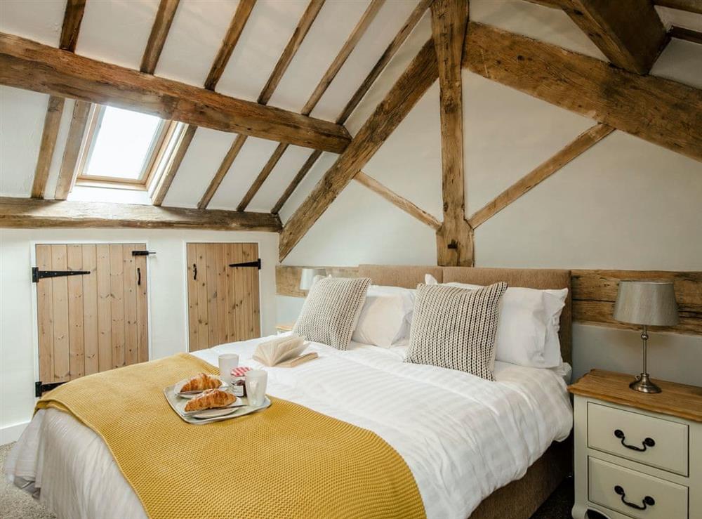 Characterful double bedroom with beams at Valley View Barn in Bradbourne, near Ashbourne, Derbyshire