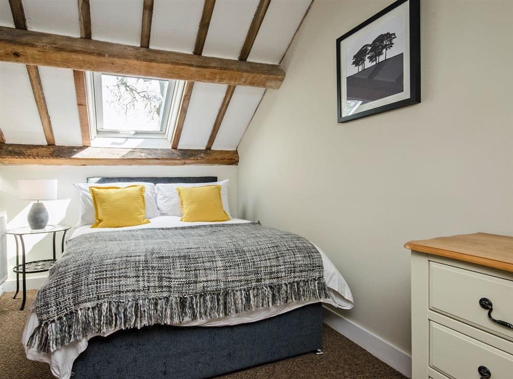 Elegantl double bedroom with beams at Valley View Barn in Bradbourne, near Ashbourne, Derbyshire
