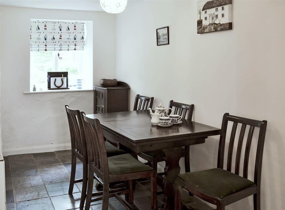 Charmingly furnished dining room at Vanstones Cottage in Stoke, near Hartland, Devon
