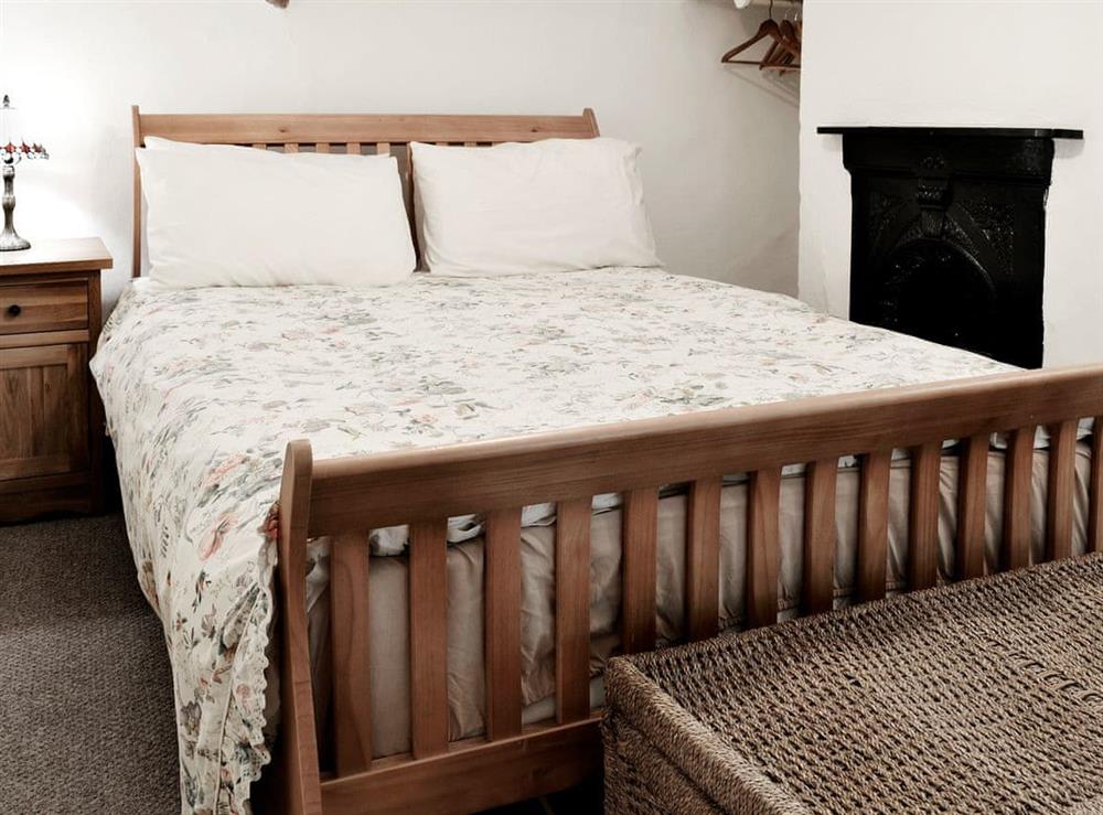 Peaceful bedroom with double bed at Vanstones Cottage in Stoke, near Hartland, Devon