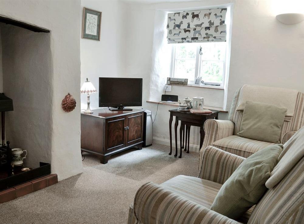 Warm and welcoming lounge at Vanstones Cottage in Stoke, near Hartland, Devon