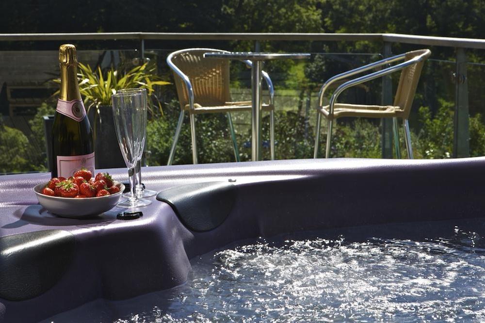 Relax and unwind in the hot tub at Vantage Point in Hillfield, Dartmouth