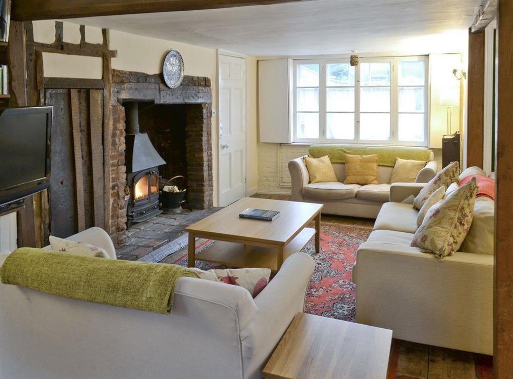 Charming living room packed with heritage features at Varley House in Saxmundham, Suffolk