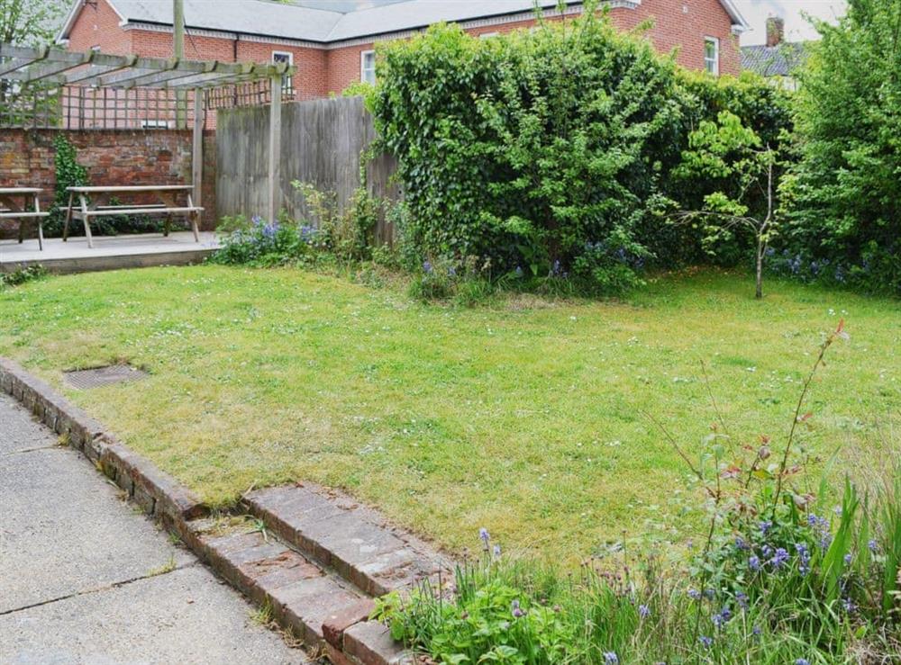 Lawned garden at rear of property at Varley House in Saxmundham, Suffolk