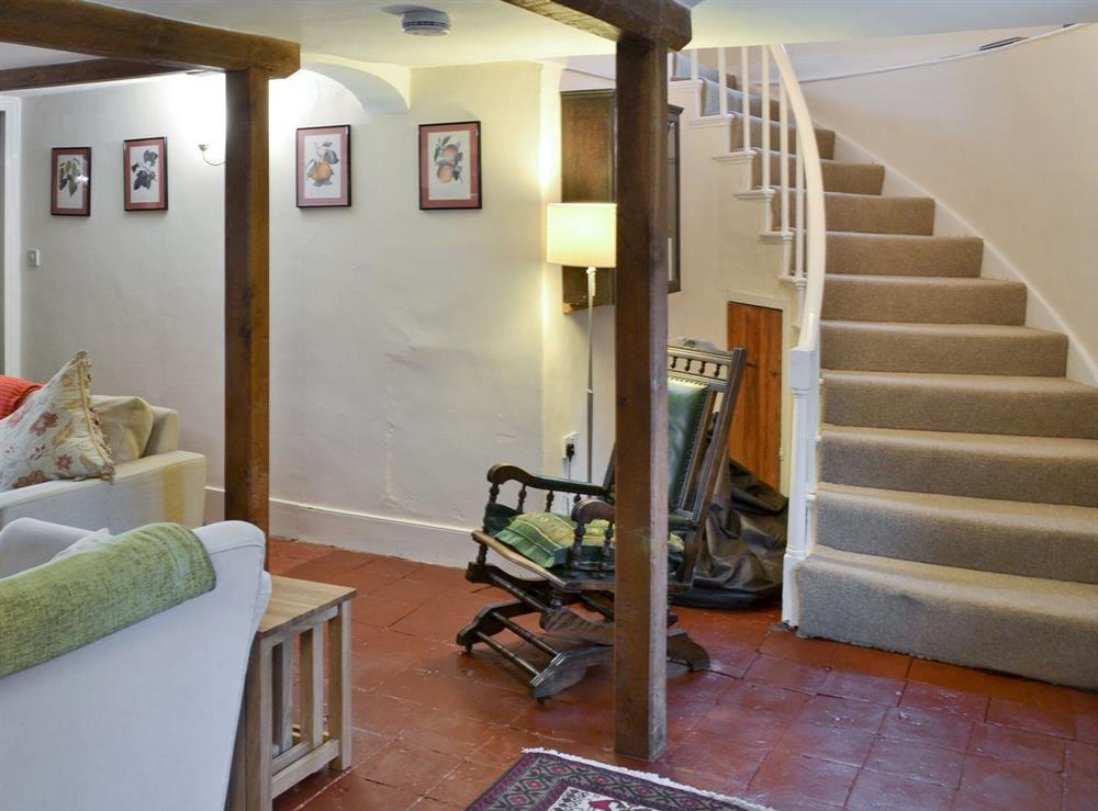 Winding stairway from lounge to upper level at Varley House in Saxmundham, Suffolk