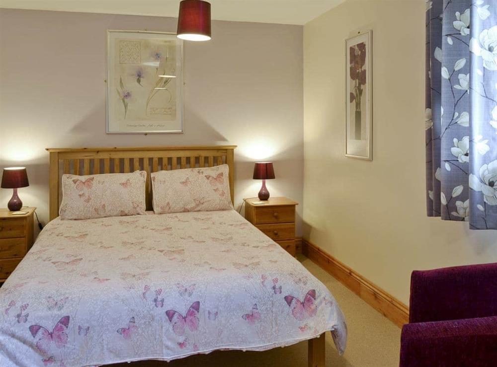 Comfortable double bedroom at Vaughan Cottage in Muston, Filey, North Yorkshire