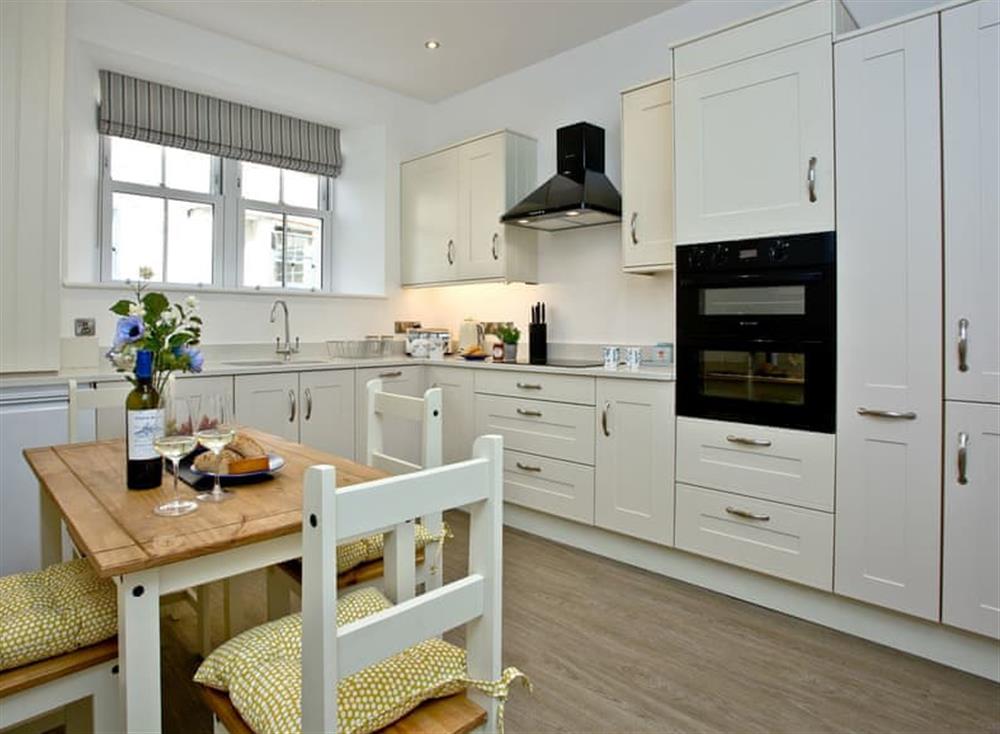 Lovely kitchen with breakfast area at Veltham House Cottage in Bampton near Tiverton, Devon