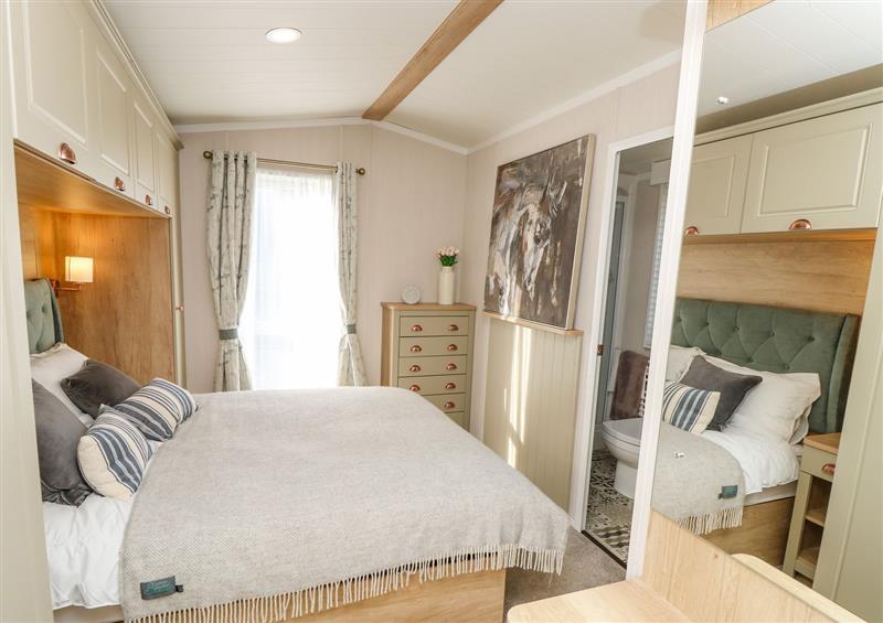 A bedroom in Vendee Lodge at Vendee Lodge, Thorness Bay Holiday Park near Cowes
