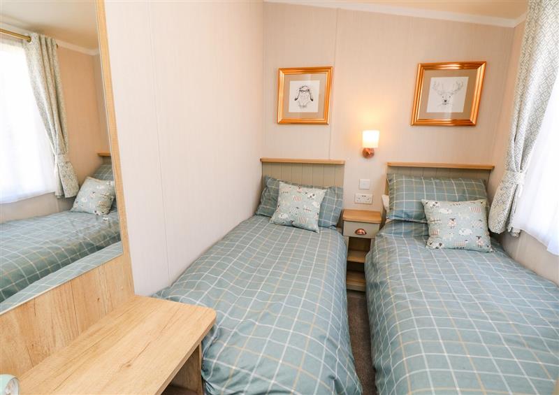 This is a bedroom at Vendee Lodge, Thorness Bay Holiday Park near Cowes