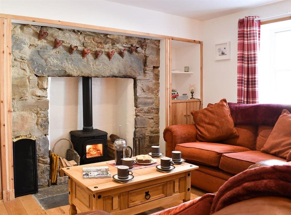 Cosy living room with spectacular fireplace at Viaduct View in Cullen, near Buckie, Highlands, Banffshire