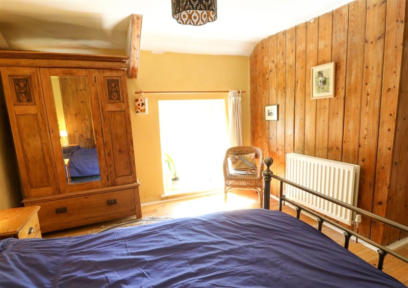 A bedroom in Victorian Farmhouse (photo 2) at Victorian Farmhouse, Ty Mawr near Llanybydder