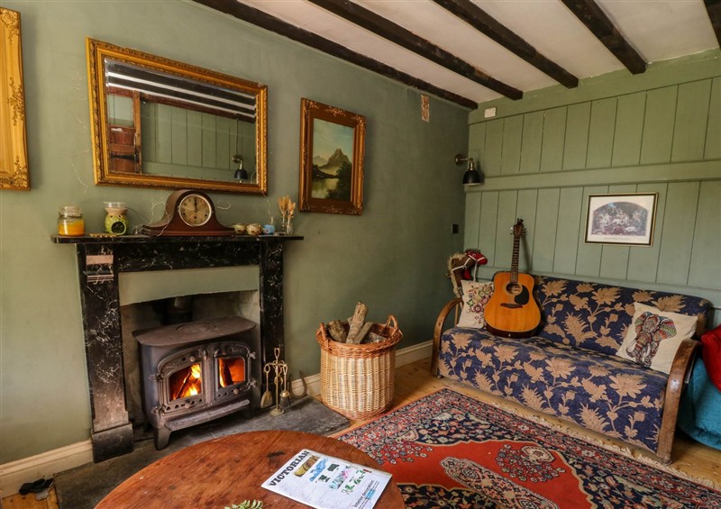 Relax in the living area (photo 2) at Victorian Farmhouse, Ty Mawr near Llanybydder