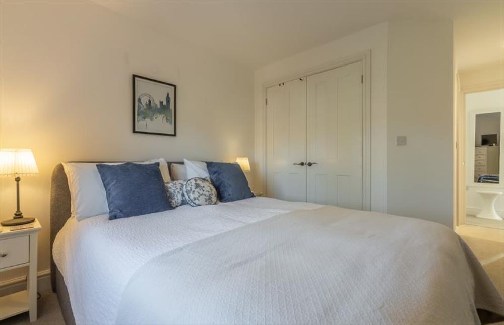First floor: Master bedroom has en-suite shower room at Victory Cottage, Little Walsingham
