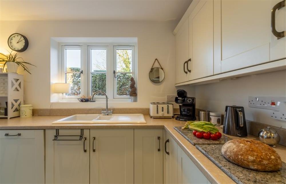 Ground floor: Bright, duel aspect kitchen at Victory Cottage, Little Walsingham