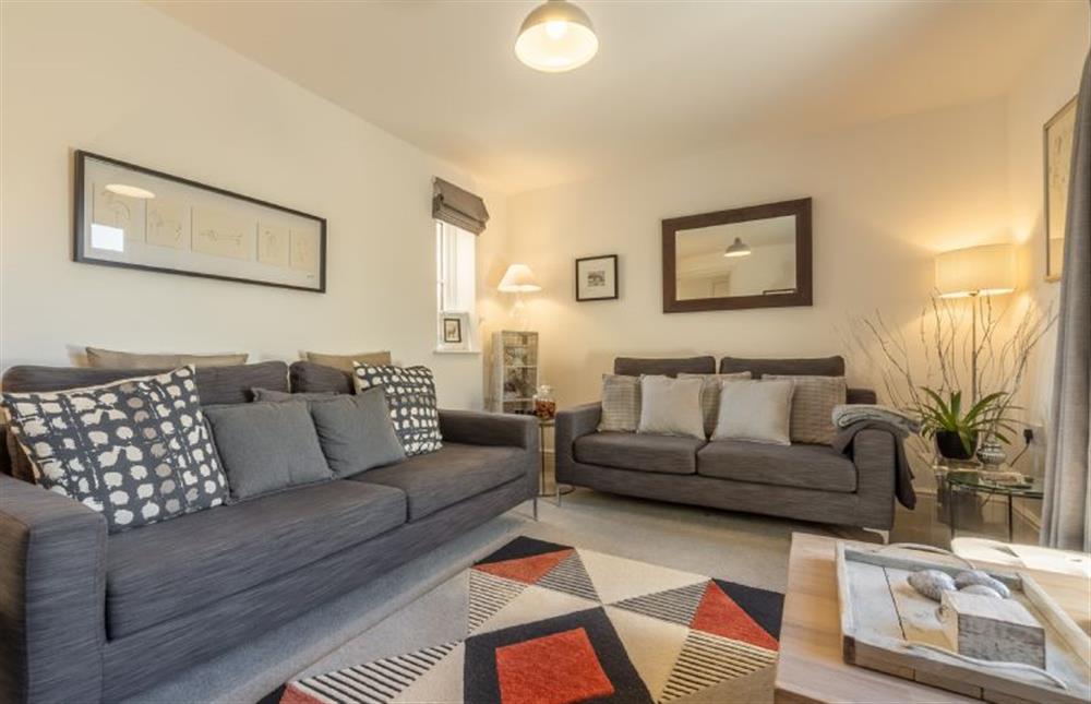 Ground floor: The sitting room has ample comfy seating at Victory Cottage, Little Walsingham