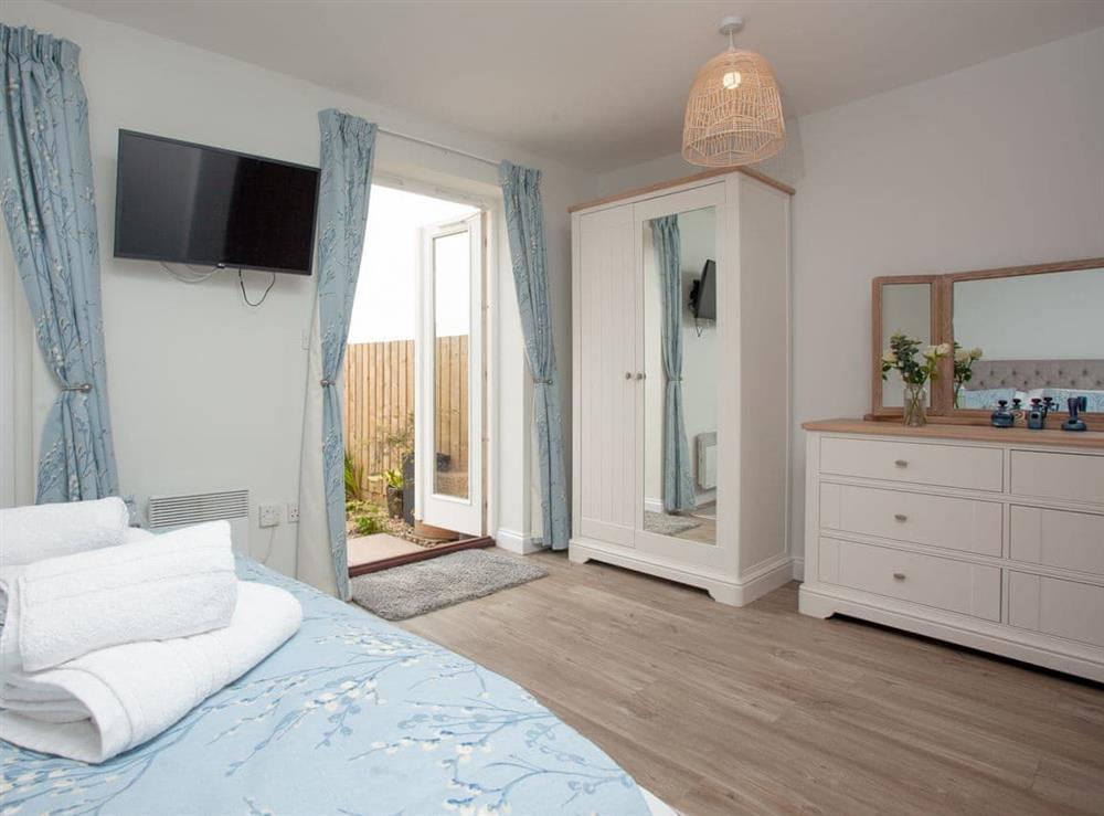 King size ground floor bedroom (photo 2) at View Cottage in Brixham, Devon