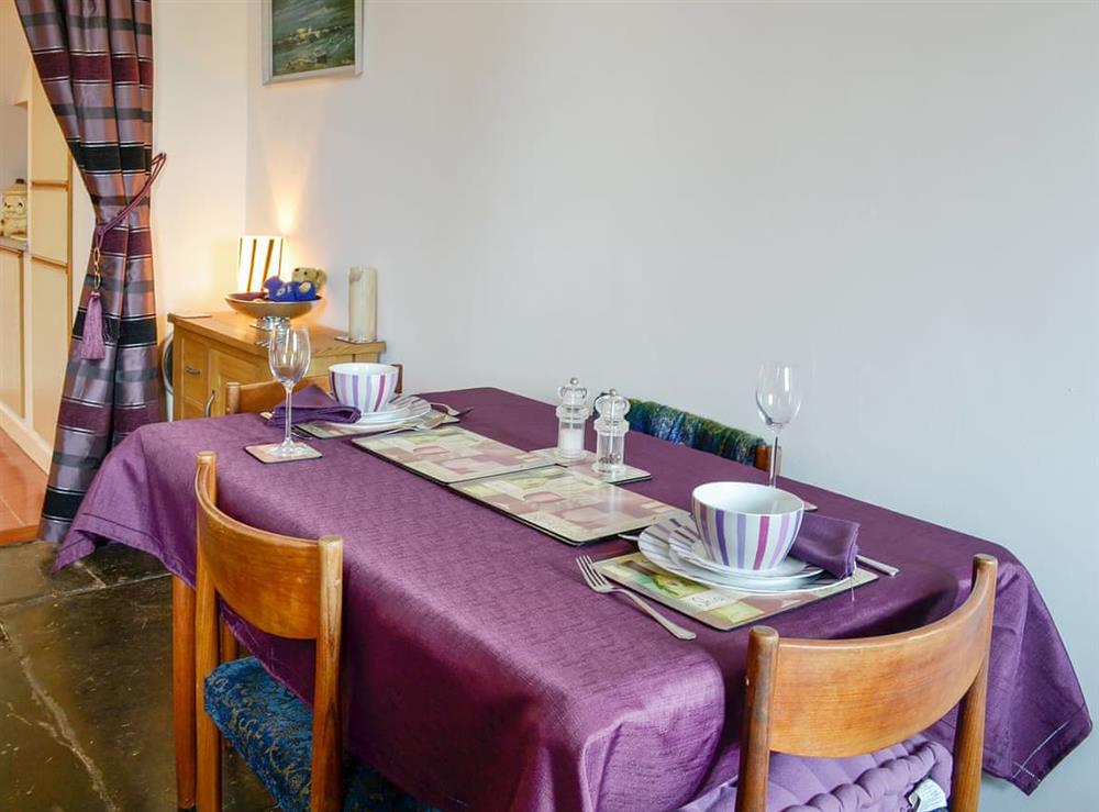 Dining area in the cosy living/dining room at View Cottage in Settle, North Yorkshire