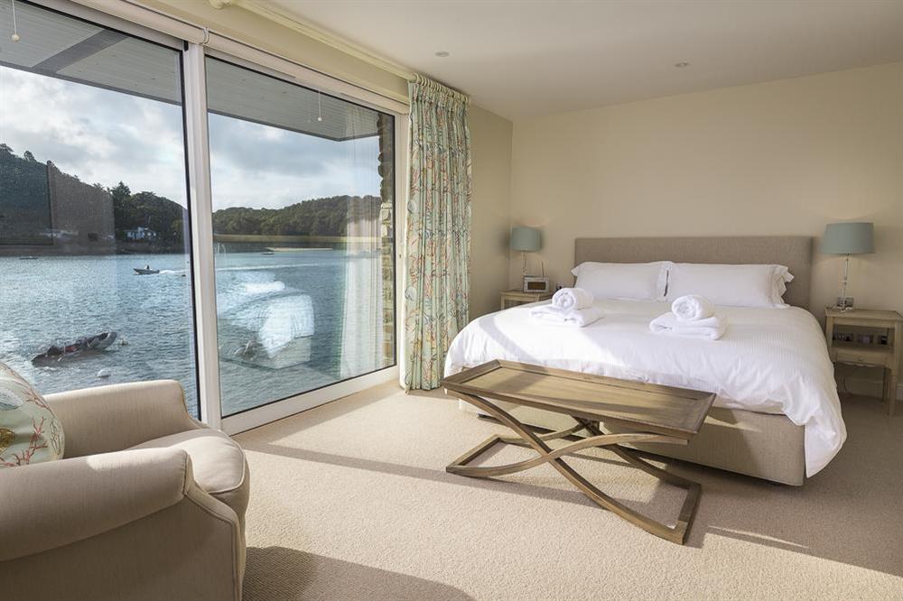 En suite master bedroom with super-King size bed with superb views and Juliet balcony (photo 2) at Villa 1, Estura in , Salcombe