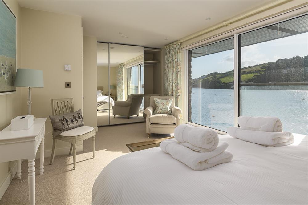 En suite master bedroom with super-King size bed with superb views and Juliet balcony at Villa 1, Estura in , Salcombe