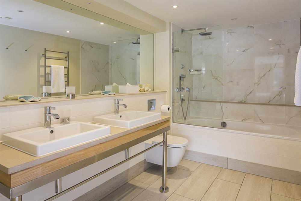 Fully tiled en suite bathroom (photo 2) at Villa 1, Estura in , Salcombe