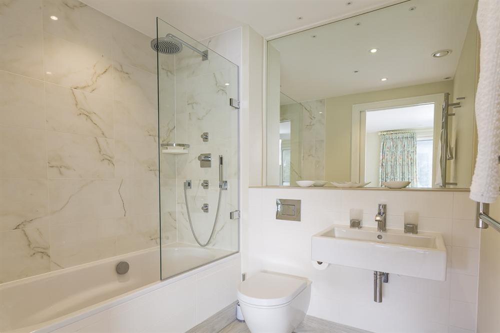 Fully tiled en suite bathroom at Villa 1, Estura in , Salcombe