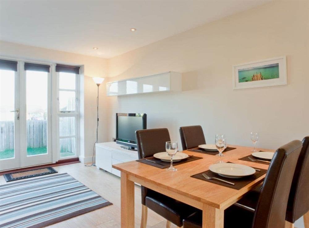 Living room/dining room at Villa 23 in St Merryn, near Padstow, Cornwall