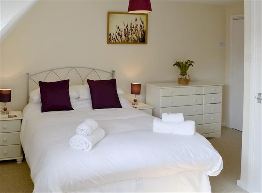 Double bedroom with an additional single at Villa 55 in Cromer, Great Britain