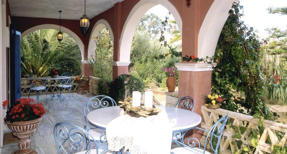Shaded dining at Villa Aresti Villas, Agios Dimitrios, Zante