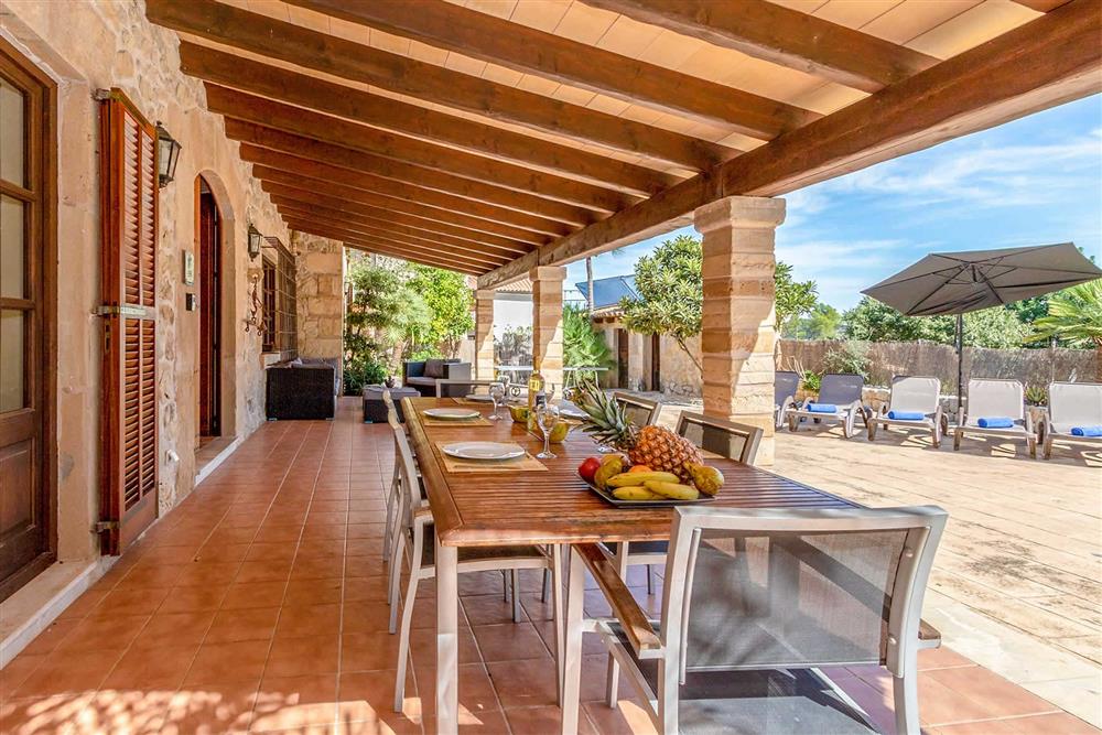 Alfresco dining, covered terrace at Villa Can Gallardo, Pollensa, Mallorca