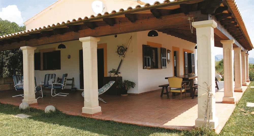 The shaded area around the villa at Villa Can Moscard, Pollensa, Majorca