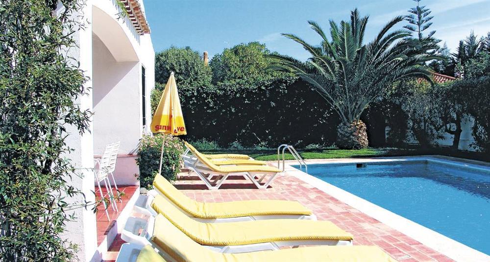 Sun loungers by the pool at Villa Casa Bougainvillea, Sao Joao, Algarve