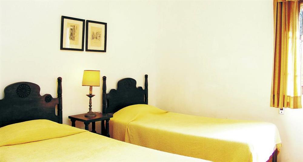 Twin bedroom (photo 2) at Villa Casa Bougainvillea, Sao Joao, Algarve
