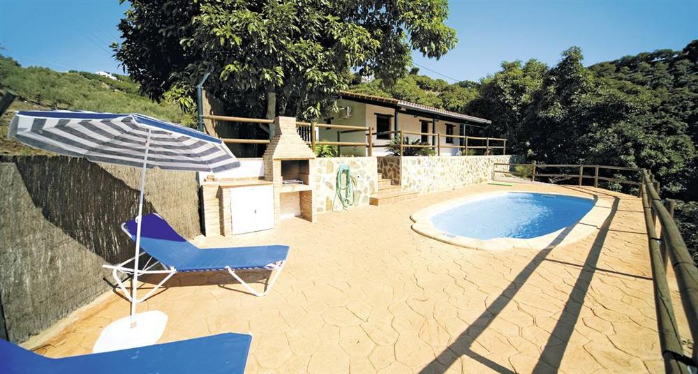 Swimming pool and sun loungers at Villa Casa Cica, Frigiliana, Costa Del Sol